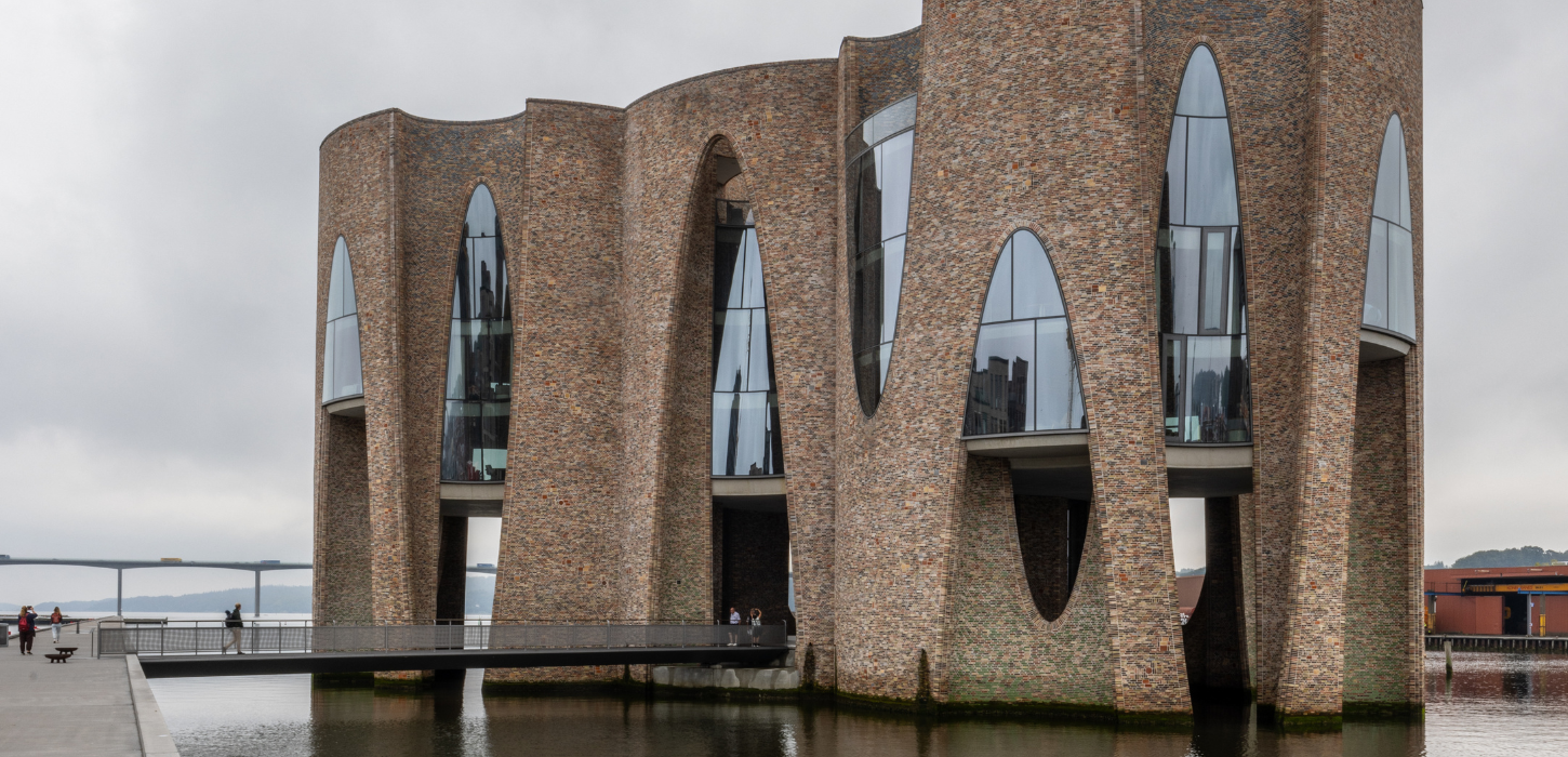 Fjordenhus at Vejle Yacht Harbor on a cloudy day