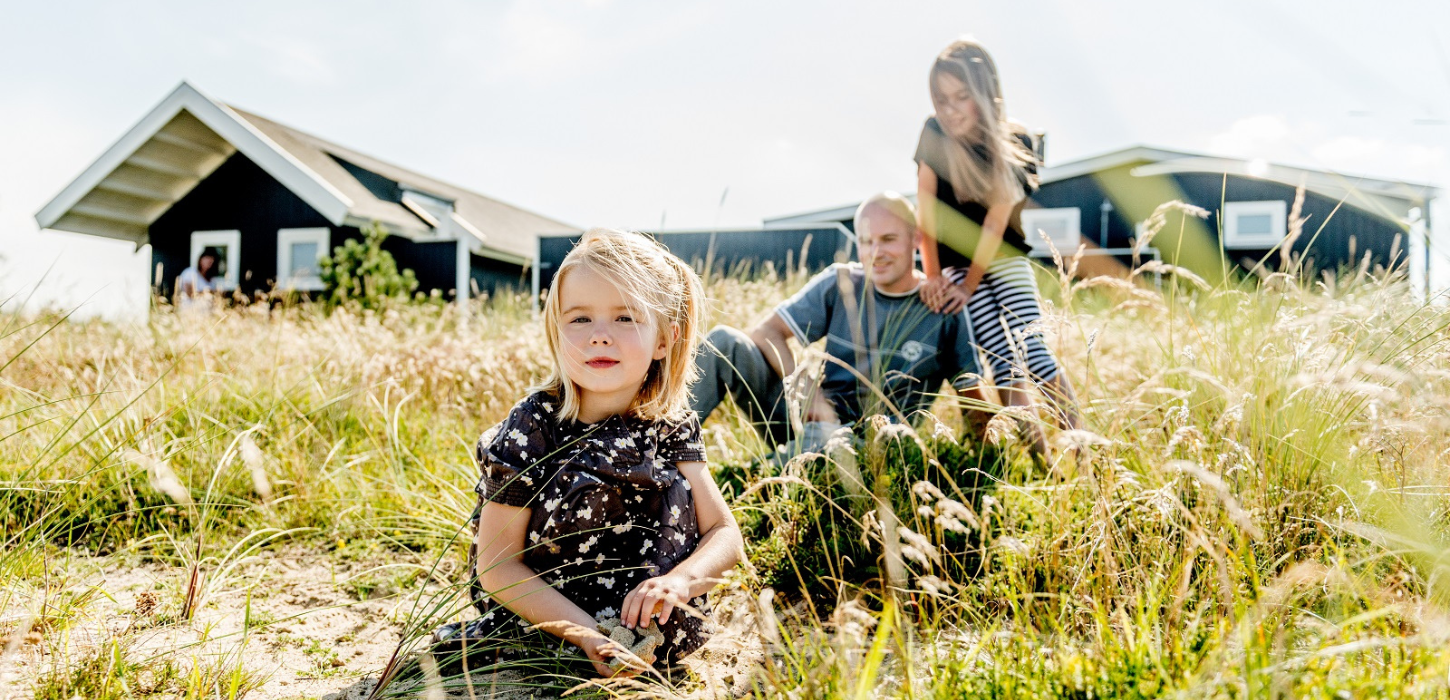 Family on holiday in a holiday home at Feline Holidays
