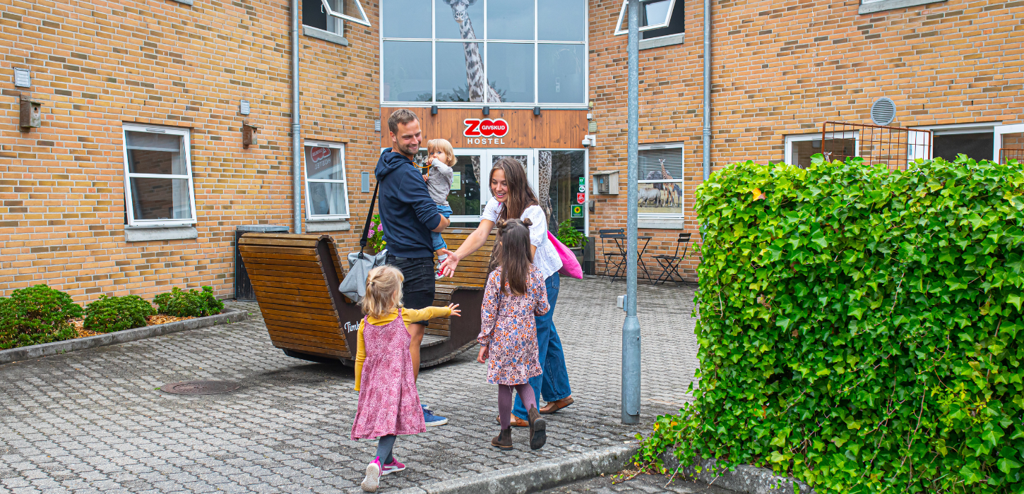 Family in front of Givskud Zoo Hostel